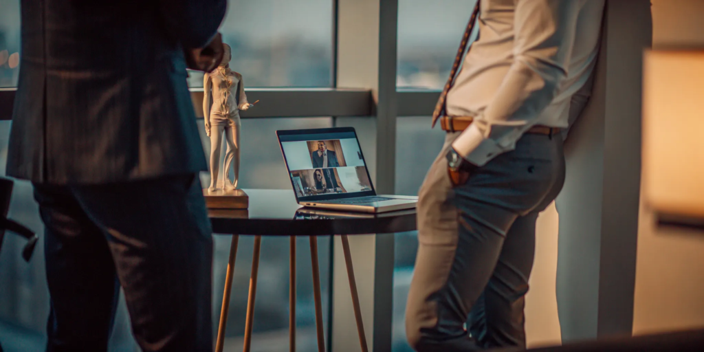 A top-rated personal injury lawyer reviews a case with a colleague in a law office.
